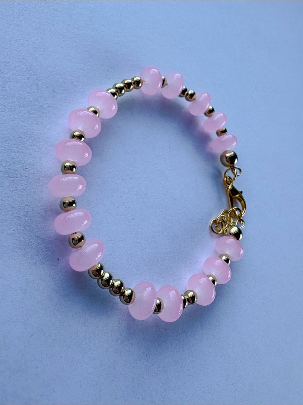 Delicate Pink Glass Bead Bracelet with Gold Accents